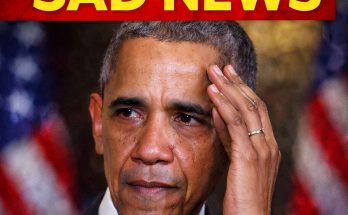 Barack Obama with tears on his face, touching his forehead with his hand, in front of