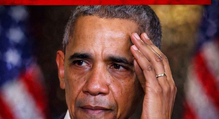 Barack Obama with tears on his face, touching his forehead with his hand, in front of